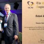 Dr Ashok Seth receiving the "Master Interventionalist" award by Dr Kenneth Rosenfield (Immediate Past President, SCAI) and Dr Kirk N. Garratt (President, SCAI) - 2017